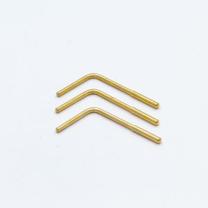 90-degree contact bend by VF Decolletage, CNC-machined from brass for aerospace, automotive, and electronic connectors.