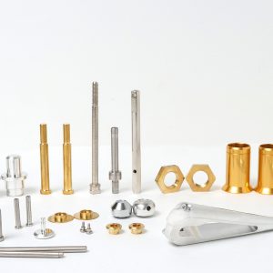 CNC machined fishing reel parts in aluminum, stainless steel, and brass by VF Decolletage